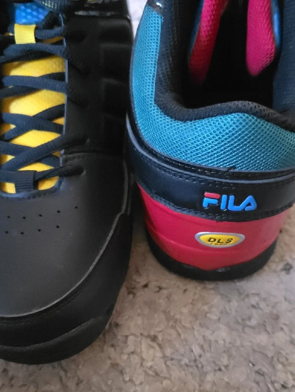 FILA Black High-Top Sneakers with Yellow and Blue Accents